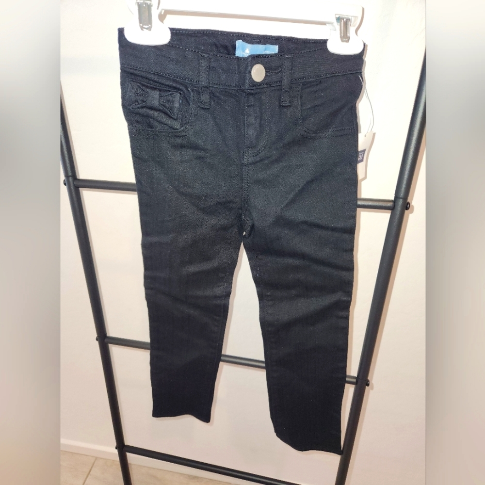 Girls Gap Skinny black jeans with bows on side and back pockets. New with tags